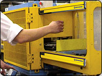 A person often needs to load and unload product from a machine or from other potentially hazardous areas.