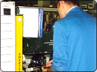 A person often needs to load and unload product from a machine or from other potentially hazardous areas.